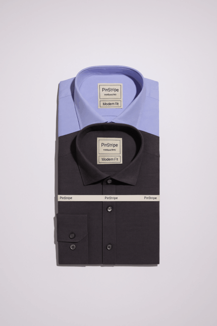 Â Gray and denim blue long-sleeved men's dress shirt, folded and packaged, with a visible brand