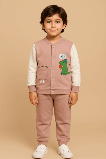 A pink and white loungewear set with a green dinosaur graphic on the chest pocket.