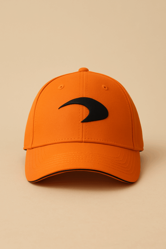 Orange baseball cap with a black logo on the front.
