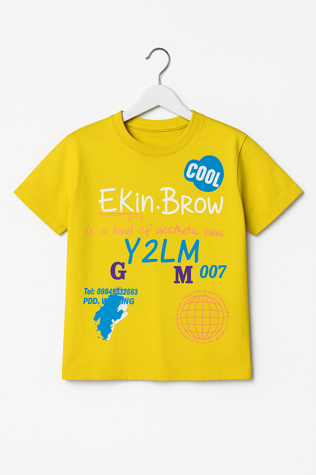 Yellow kids' t-shirt with "COOL" text, abstract blue graphics, and letters "Y2LM", "G", and "M".