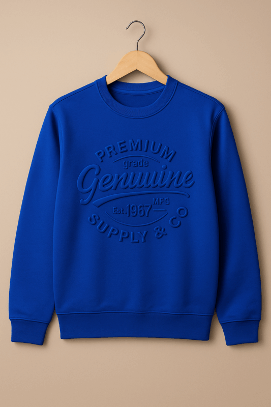 A blue long-sleeved sweatshirt with embossed text on the front that reads