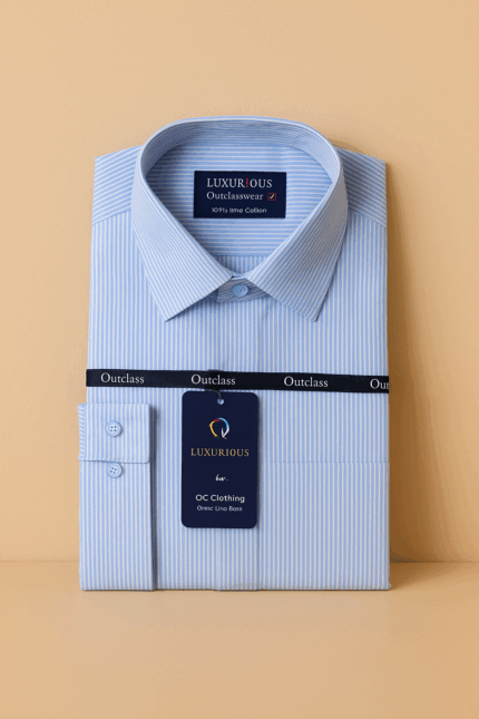 Â A light blue men's dress shirt with fine vertical stripes, folded neatly on a light brown surface.