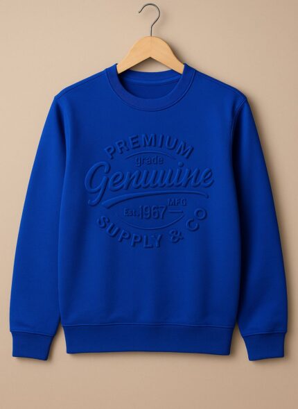 A blue long-sleeved sweatshirt with embossed text on the front that reads