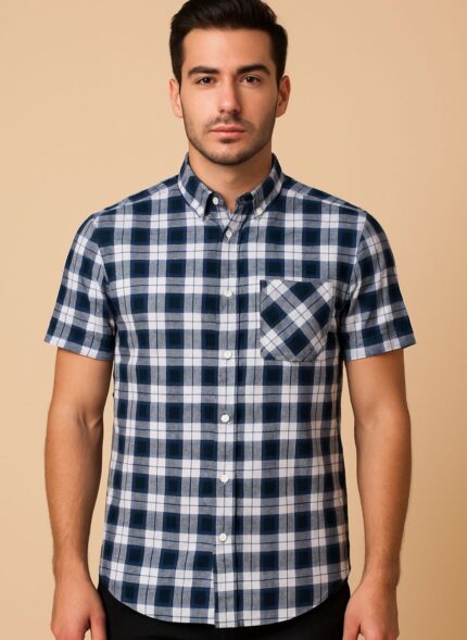A short-sleeve navy and white plaid or checked button-up shirt stands facing forward.