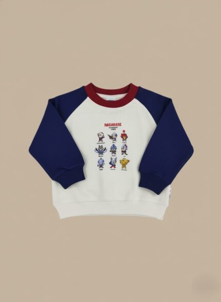 Kids sweatshirt with navy sleeves, maroon neckline, and cartoon space characters printed on white cotton fabric.