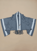 Grey women's hooded knit sweater shawl with geometric stripes and fringe
