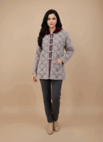 Gray women's winter sweater with burgundy faux fur collar and patterned knit.