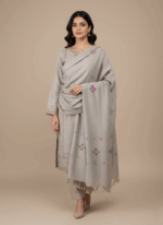 Wool shawl with colorful floral printed on a light background.