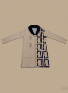 Women's beige and navy wool blend sweater with geometric pattern and faux fur collar.