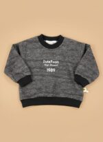 Grey kids sweater with black ribbed cuffs and embroidered “DoteRoom 1989” text.
