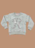 Mint green kids' crewneck sweater with a large, textured sequin 'R' appliqué on the front