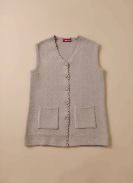 SmartMauve women's heathered beige button-front sweater vest with scalloped V-neck and two front pockets on a light background.