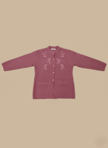 Dusty rose women's knit sweater with embroidered leaves and front pockets.