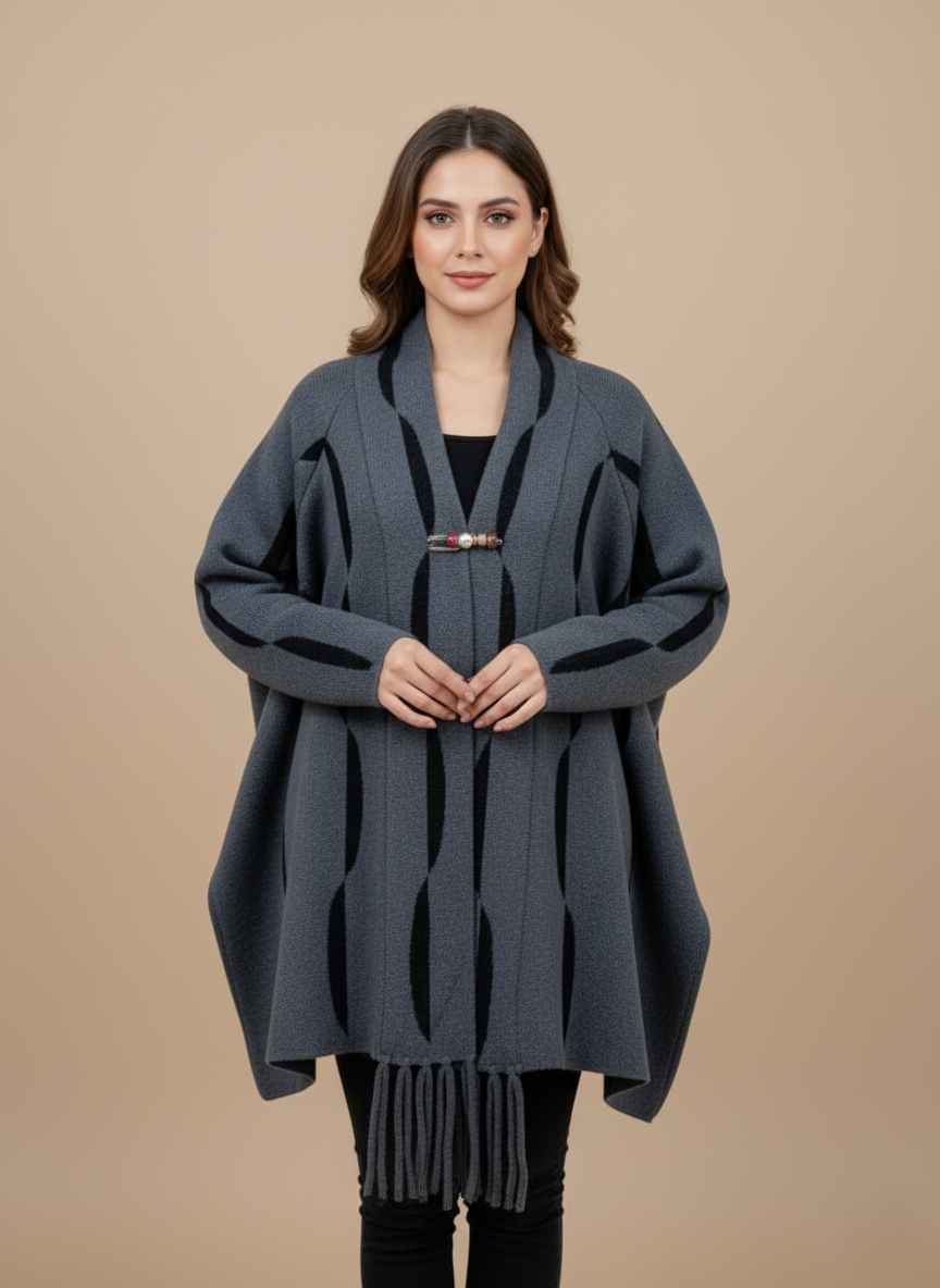 Women's Grey Kimono Sweater with Black Pattern & Fringe Detail Women's grey kimono sweater with black wave pattern and fringe, front view, open-front knit, toggle closure.