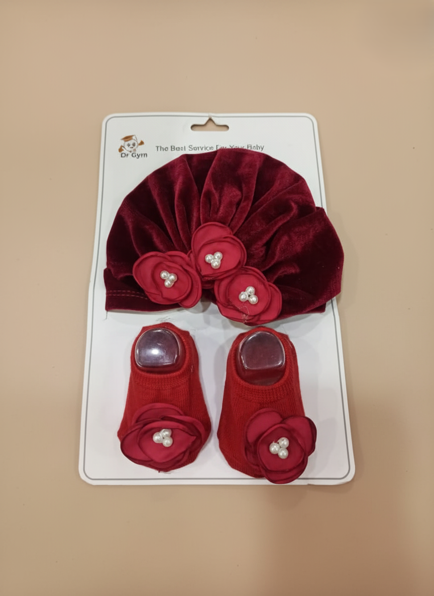 Elegant Red Baby Headband and Socks Set with Floral Design Red baby headband and socks set with floral pearl design on soft cotton fabric for newborns.
