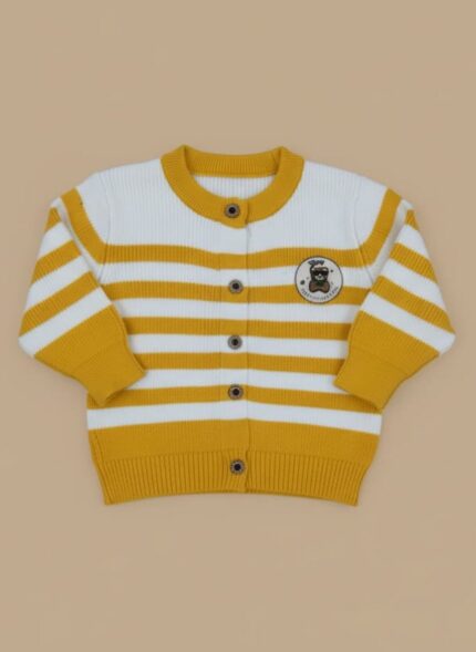 Yellow and white striped round neck kids sweater with a bear patch on a light brown background, front view.