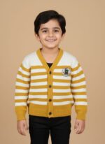 Young boy smiling in a yellow and white striped V-neck kids sweater with a brown bear patch and buttons.