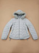 Light grey women's hooded puffer jacket with faux fur trim, quilted design, and zippered pockets.