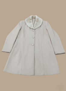 Women's vintage beige wool blend coat with a white faux fur collar, three front buttons, and two front pockets, displayed flat on a light brown background.