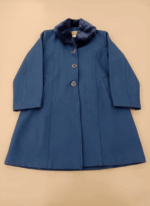 Women's blue wool coat featuring a black faux fur collar, three large dark buttons down the front, and a flared A-line cut, displayed on a light brown background.