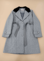 Women's grey wool blend coat with black faux fur collar and belt, hanging flat on a light background.