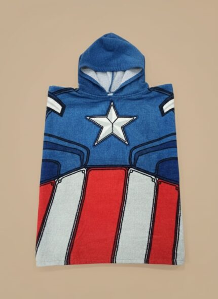 Blue, red, and white superhero-themed kids hooded towel poncho with star emblem, folded on beige background.