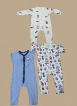 Three different baby rompers displayed on a neutral background, including a white patterned long-sleeve romper, a blue short-sleeve romper with an embroidered bear, and a white patterned long-sleeve baby romper.