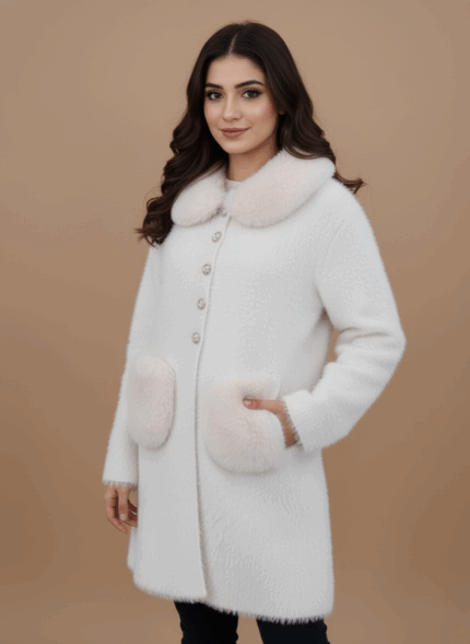 White women' winter coat with light pink faux fur trim on the collar and two front pockets, closed with clear decorative buttons.