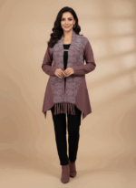 Women's open front cardigan sweater in a warm maroon/brown tone with a lighter patterned front panel, fringed bottom, and a small clasp or brooch closure.