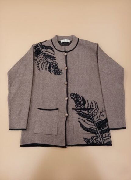 Grey knit women's sweater with black embroidered leaf designs, a button-front closure, and front pockets, laid flat on a neutral background.