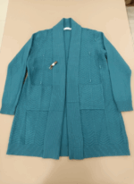 Women's long teal knitted open-front sweater with pockets, flat lay view, showing textured knit detail and garment tag.