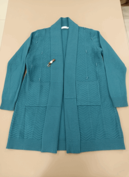 Women's long teal knitted open-front sweater with pockets, flat lay view, showing textured knit detail and garment tag.