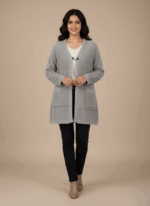 Grey fuzzy knit sweater for women with white lace trim and front clasp closure.