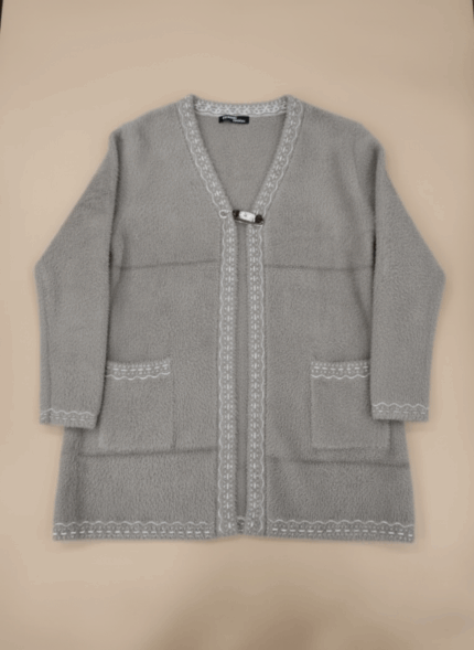 Grey fuzzy knit sweater for women with white lace trim and front clasp closure.
