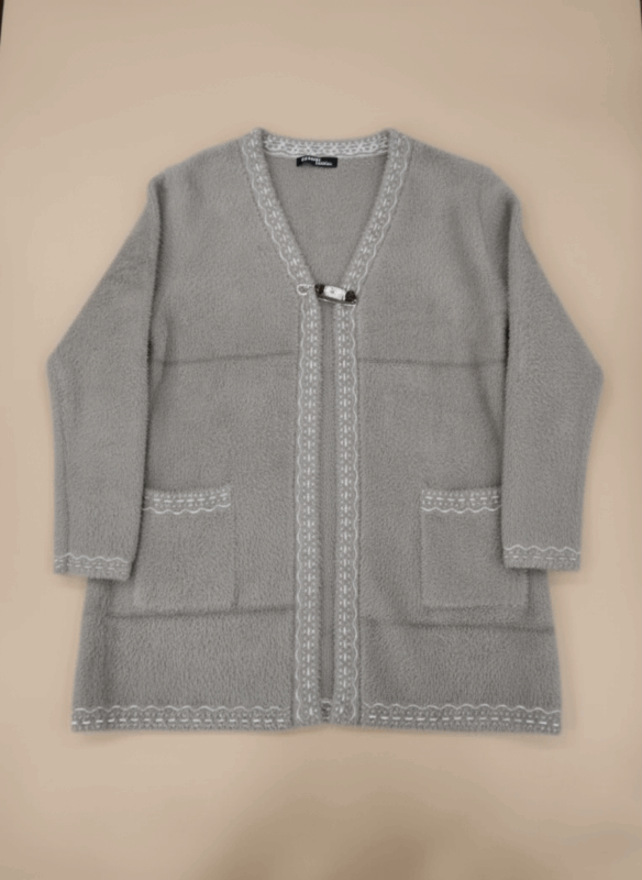 Grey fuzzy knit sweater for women with white lace trim and front clasp closure.