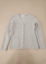 Women's textured button-front sweater, beige, V-neck, long sleeves, two front pockets, knitwear, casual, comfortable, stylish.