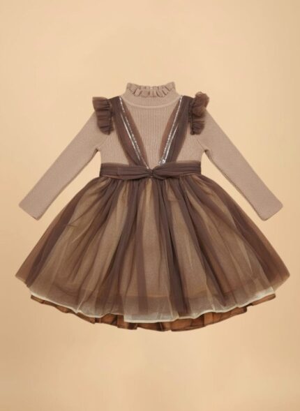 Toddler wearing brown girls party dress with ruffled shoulders and tulle skirt.