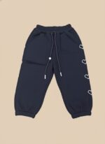 Navy girls heart jogger pants with heart embroidery and elastic waistband.