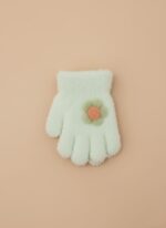 A close-up of a single mint green plush kids mitten with a green and orange flower appliqué.