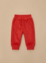 A single pair of bright red toddler fleece pants with an elastic waistband and ribbed cuffs, laid flat on a neutral background.