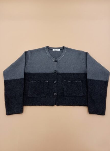 Women's two-tone knit button-up sweater, grey and dark grey, with white stitching and front pockets