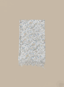 White paisley print viscose shawl with blue green gold pattern and fringe edges