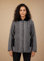 Women's grey alpaca blend sweater with vertical stripes, black faux fur collar, black faux fur pockets, and button-front closure on a light background.