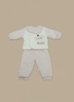 Pink newborn baby sweater set with an elephant design on a cream vest and matching ribbed pants, modeled by a smiling infant.