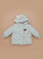 Mint green Baby Girls Quilted Jacket with hood, floral bow, and attached bunny plush toy on a light brown background.