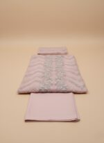 Charlotte Pink Embroidered Luxury Organza Suit with detailed silver embroidery on shirt and dupatta, paired with raw silk trouser, worn by a model in a studio setting.