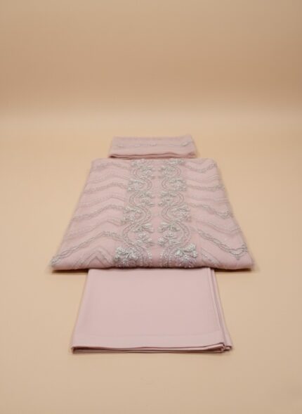 Charlotte Pink Embroidered Luxury Organza Suit with detailed silver embroidery on shirt and dupatta, paired with raw silk trouser, worn by a model in a studio setting.