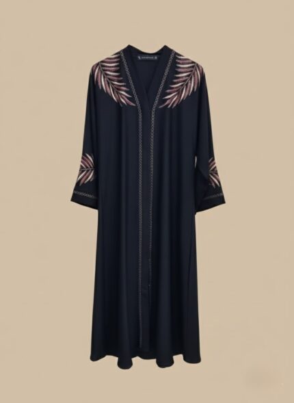 Sand-tone woman abaya in crepe, open-front kimono sweater style, side pockets and belt shown on model in daylight studio