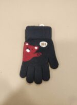 A young child smiling and raising their hand, wearing a black knit glove with a red cartoon bear and "Hi" speech bubble on the back.