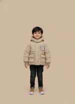 Tan hooded kids puffer jacket with "FUNBEAR" branding and a bear emblem, worn by a young boy.